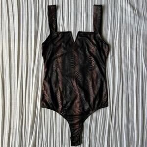 Snake print bodysuit in black